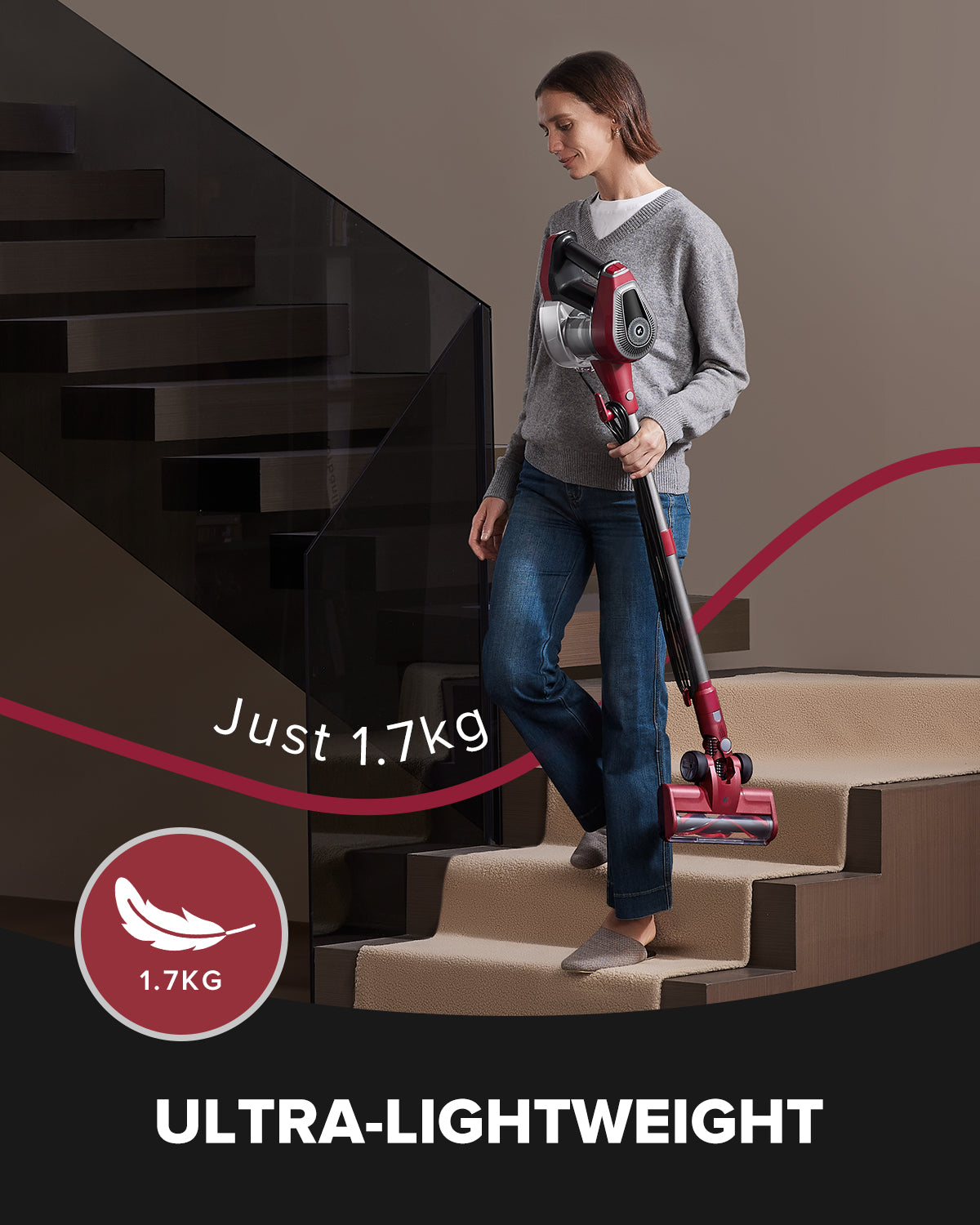 Woman carrying a lightweight vacuum cleaner up stairs with text 'Just 1.7kg' and 'ULTRA-LIGHTWEIGHT'.