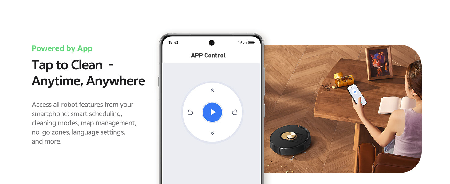 Smart home control app interface with smartphone and robot vacuum cleaner on a wooden desk.